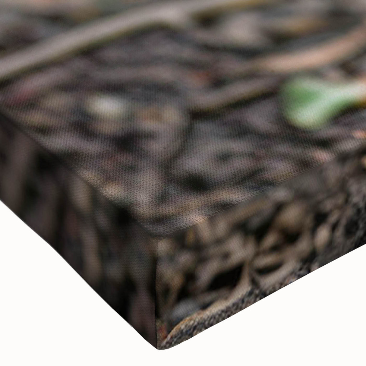 Close-up of a stretched canvas showcasing vibrant African tribal art with intricate patterns and textures, ideal for home decor and cultural aesthetics.