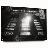 Large abstract wall art in blue and silver hues on acrylic glass, ideal for modern bedroom or dining room decor.