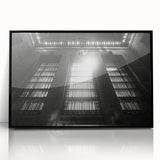 Large abstract wall art in mid-century modernist style, featuring swirls of blue and gray on a framed acrylic print.