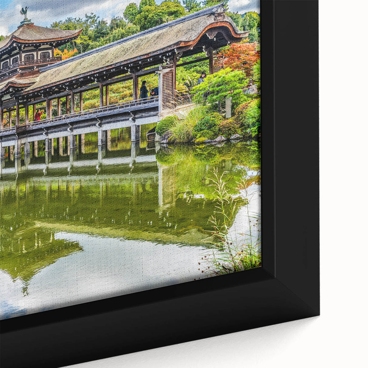 Close-up of black textured art on a large framed canvas with colorful abstract patterns, suitable for living room decor.