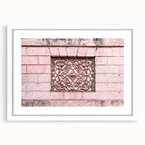 Abstract art print featuring swirling blue and gray patterns on a white framed canvas, suitable for dining room decor.