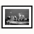 Abstract art print featuring a vibrant, colorful cityscape on textured canvas, ideal for living room decor.
