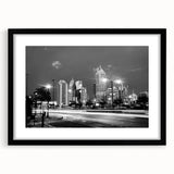Abstract art print featuring a vibrant, colorful cityscape on textured canvas, ideal for living room decor.