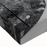 Large art depicting a black and white city landscape on canvas, ideal for bedroom ambiance.