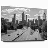 Large abstract wall art featuring swirling blue and gray tones on canvas, ideal for modern bedroom or dining room decor.