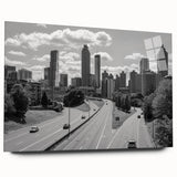 Large abstract wall art featuring swirling blues and grays on canvas, suitable for bedroom or dining room decor.