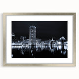 Textured abstract art print featuring swirling blue and gray tones on canvas, suitable for enhancing bedroom ambiance.