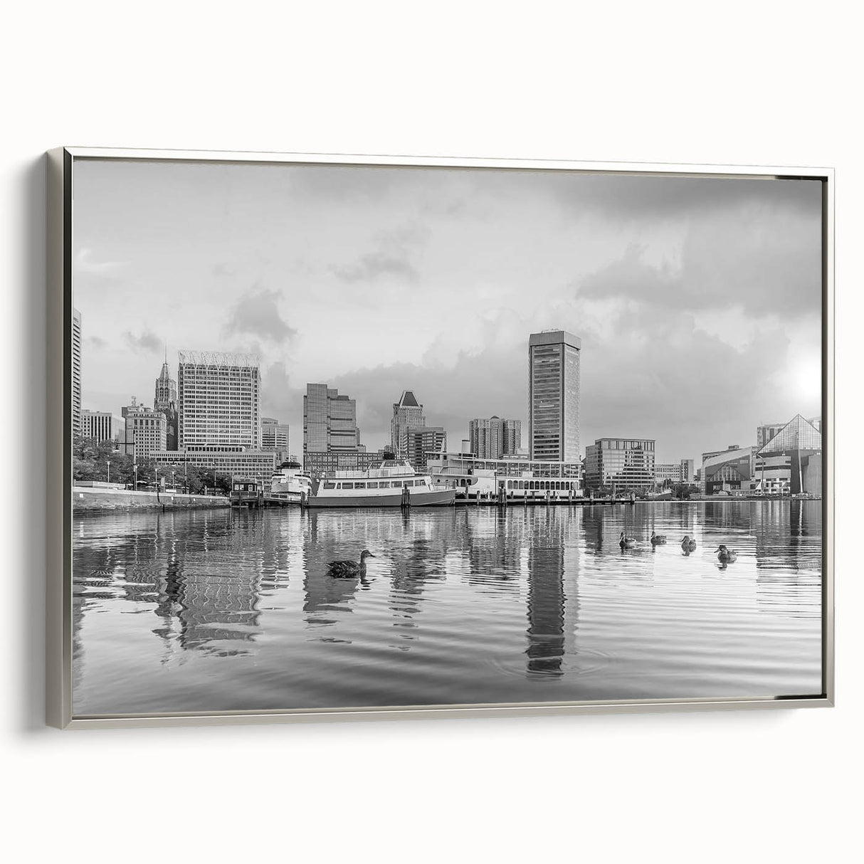Landscape art painting of a cityscape in muted black and colorful highlights on a framed poster, suitable for office decor.