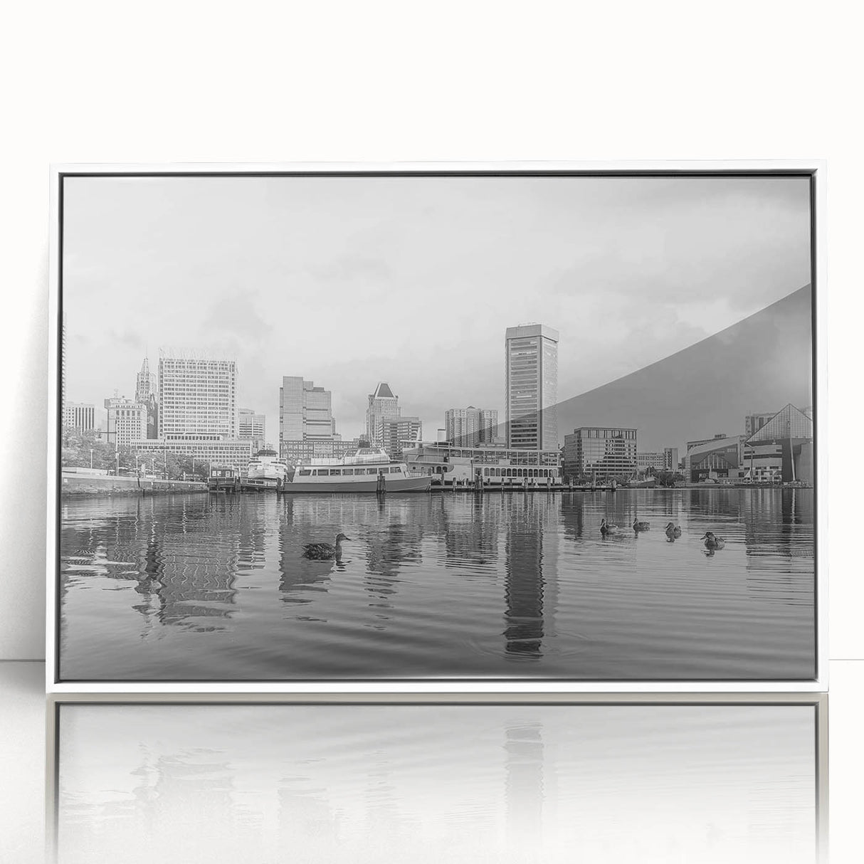 Art deco poster of a stylized cityscape in muted blue and gray tones on canvas.