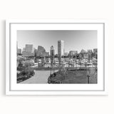 Abstract art print featuring a swirl of vibrant blues and greens on a canvas, ideal for modern bedroom or dining room decor.