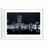 Abstract art print featuring swirling hues of blue and white, ideal for modern dining room decor.