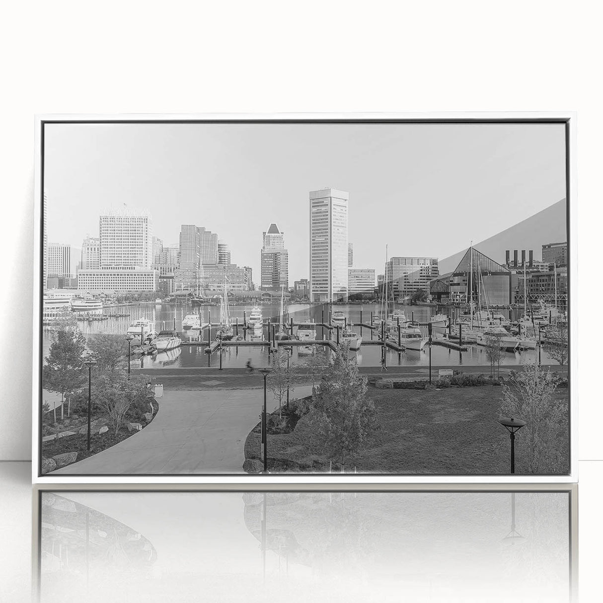 Art deco poster of a stylized cityscape in muted gold and navy tones on canvas.