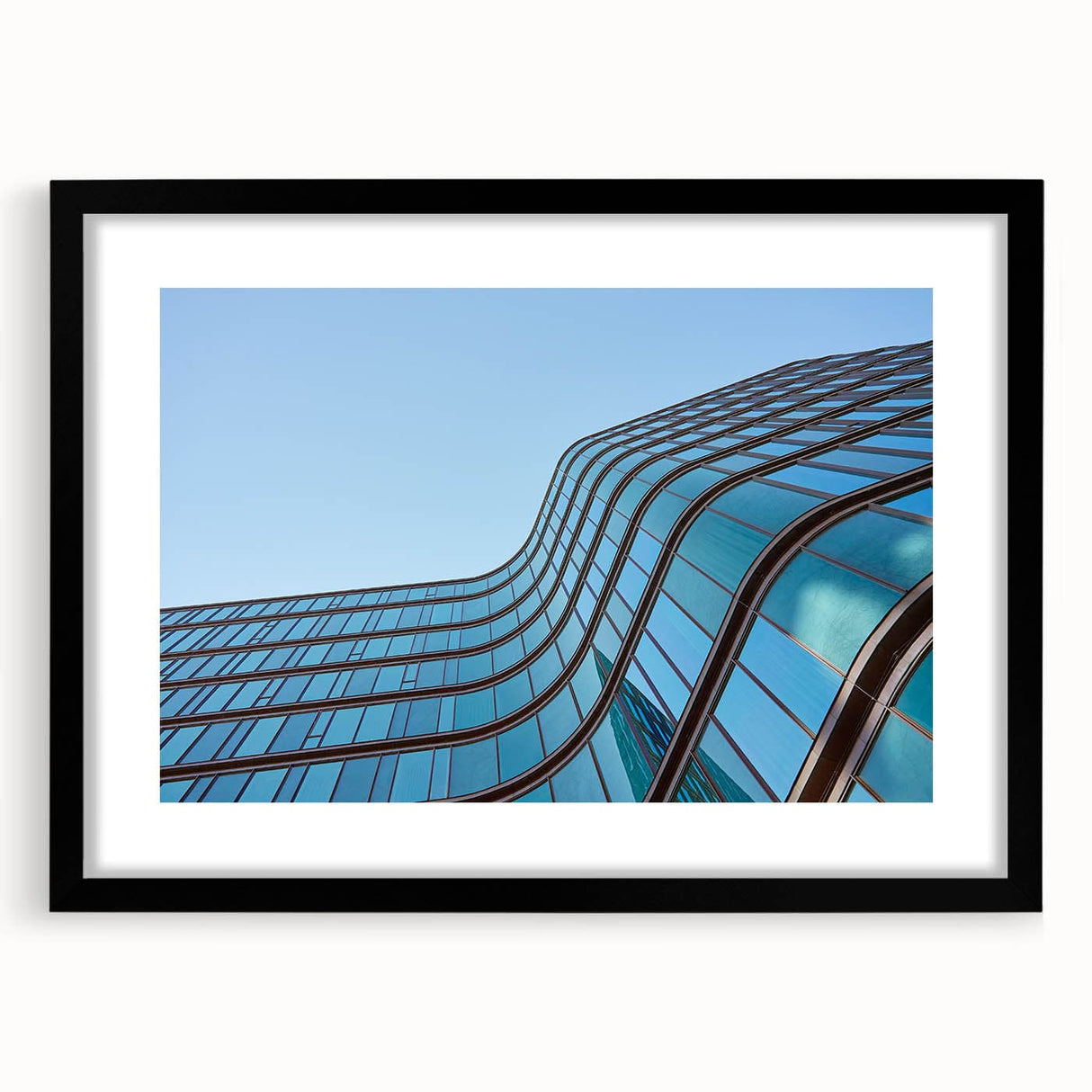 Urban skyline canvas prints – Sleek curved glass building photo