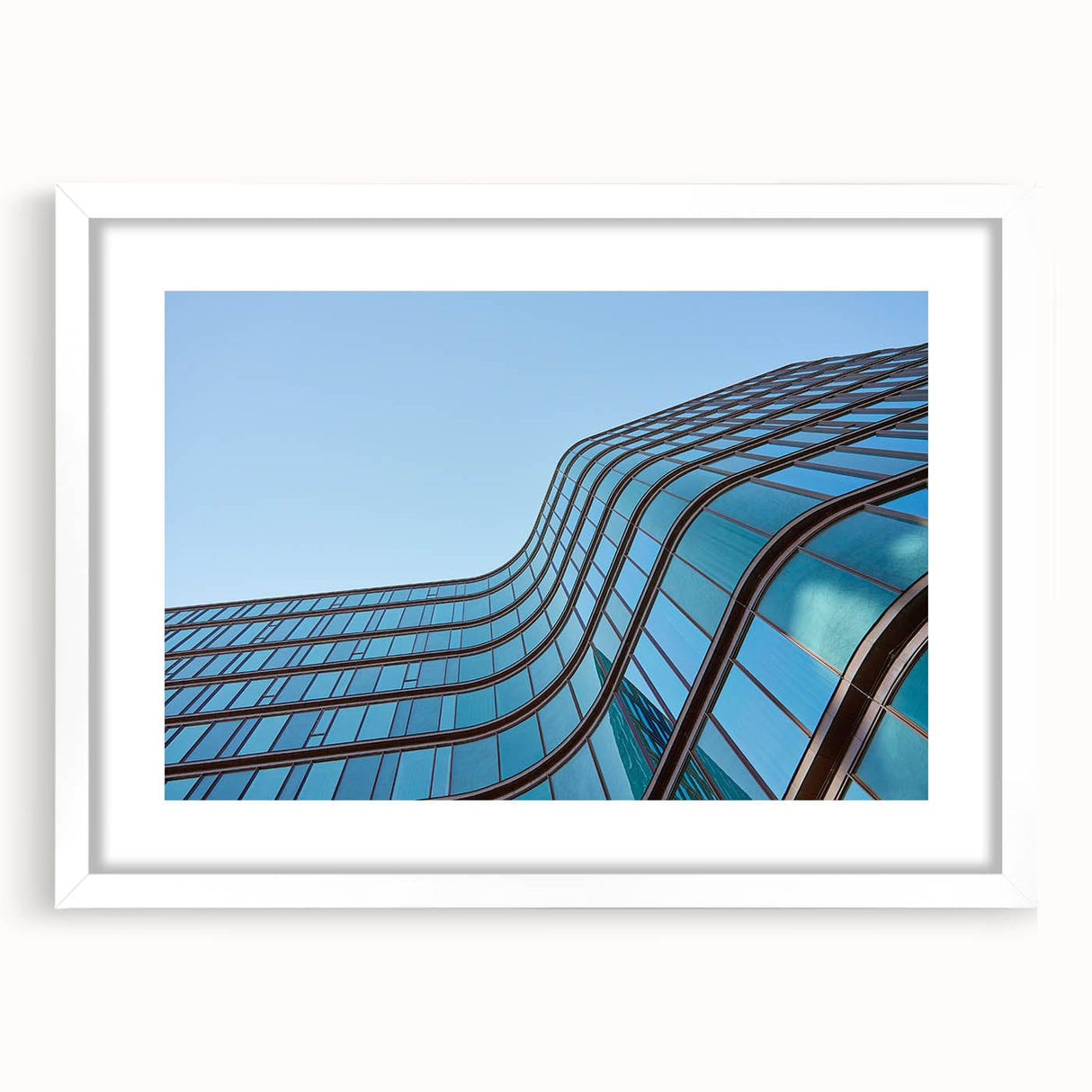 Urban skyline canvas prints – Sleek curved glass building photo