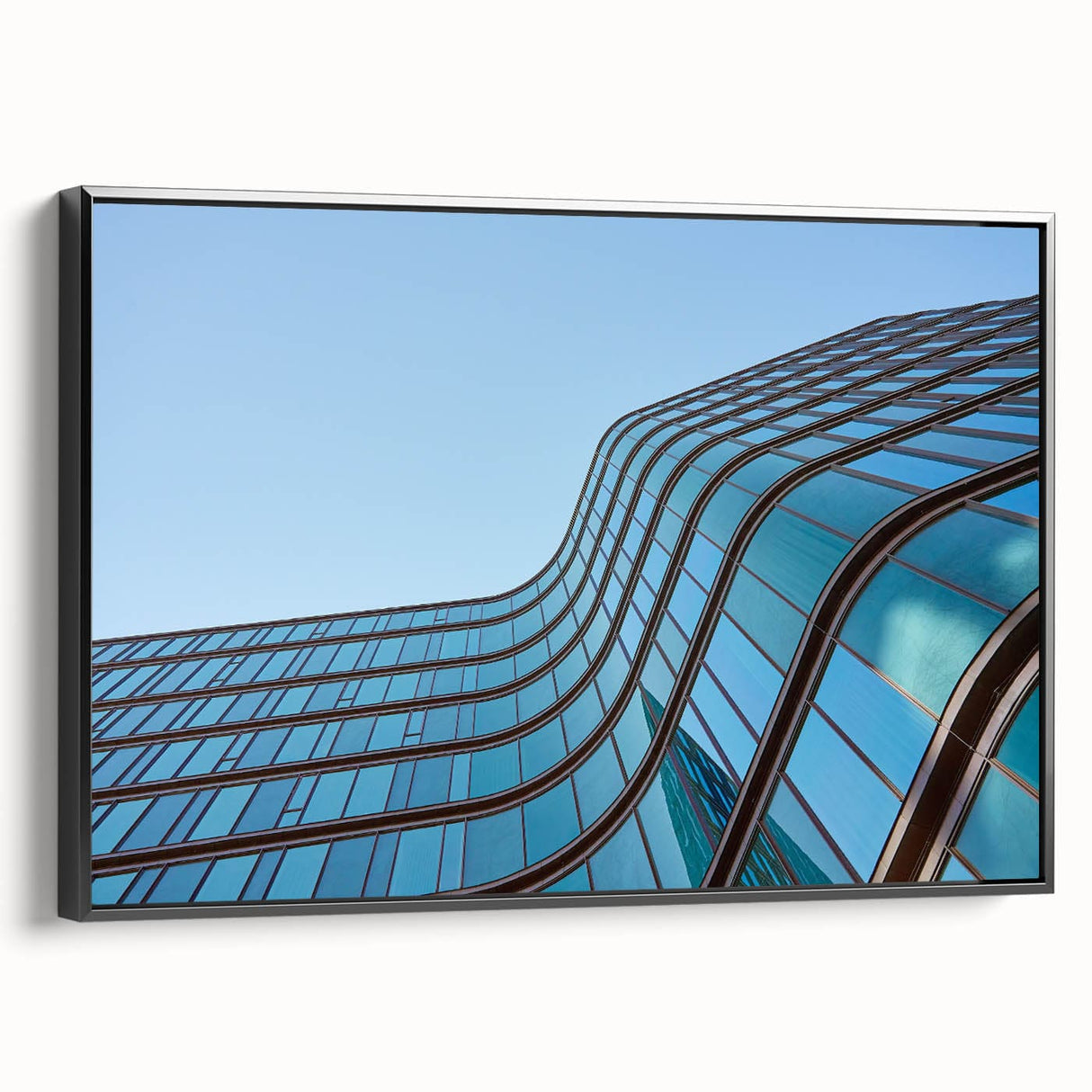 Urban skyline canvas prints – Sleek curved glass building photo