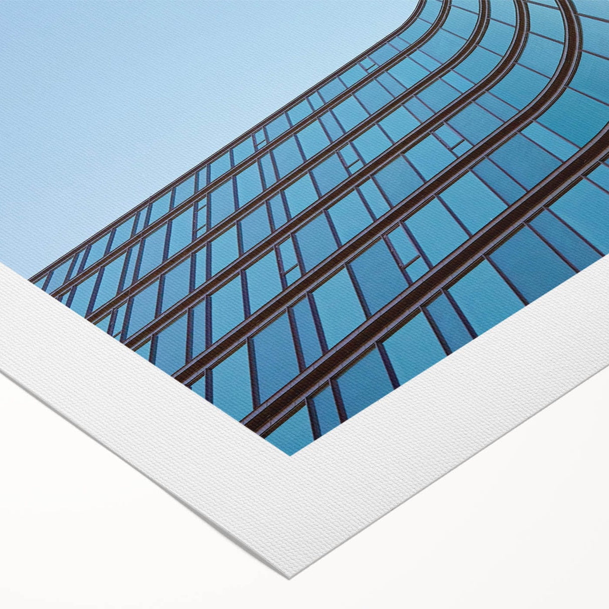 Urban skyline canvas prints – Sleek curved glass building photo