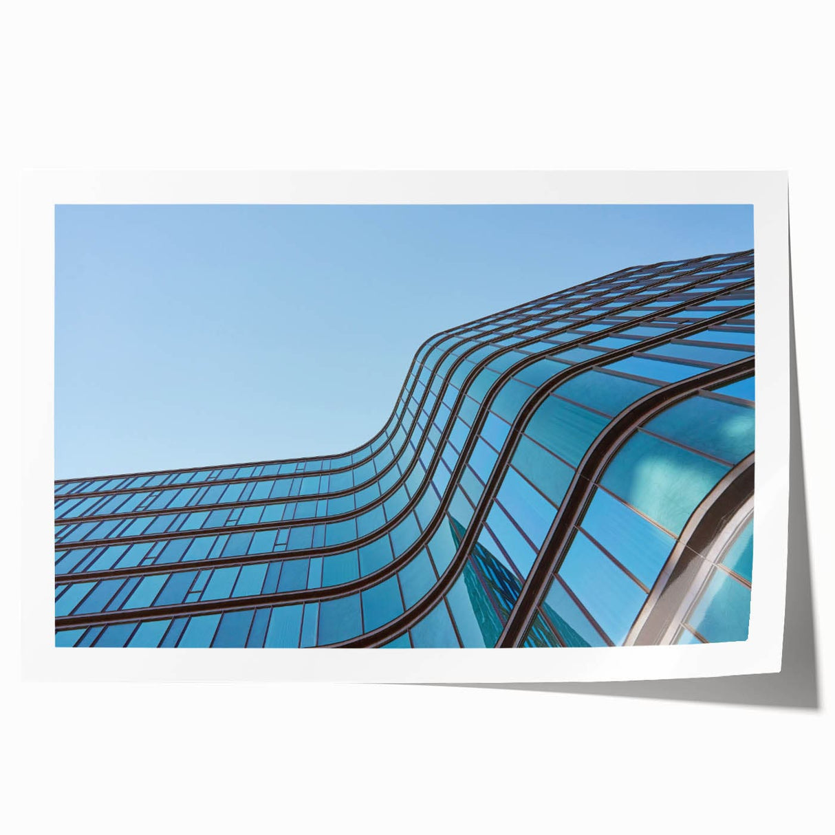 Urban skyline canvas prints – Sleek curved glass building photo