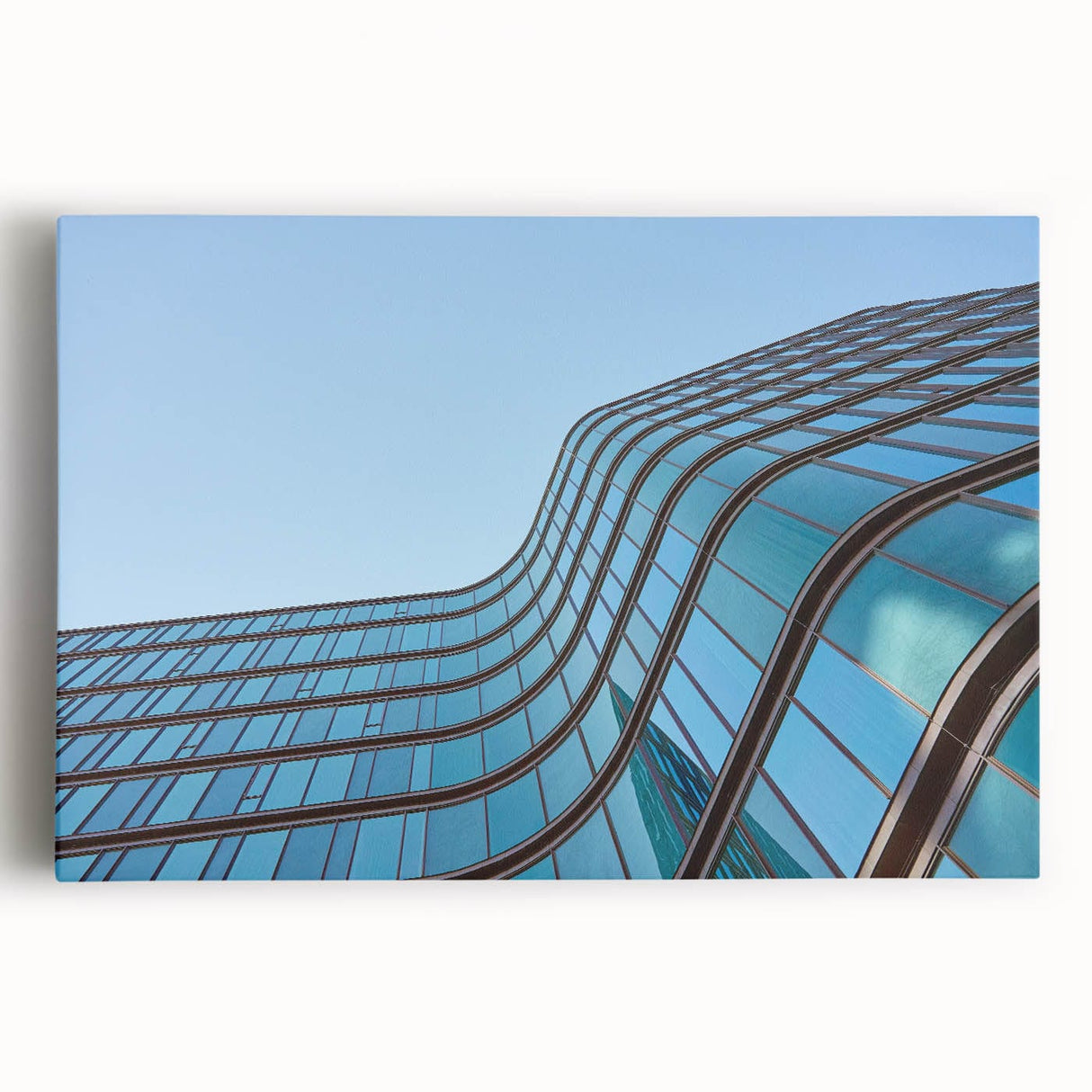 Urban skyline canvas prints – Sleek curved glass building photo