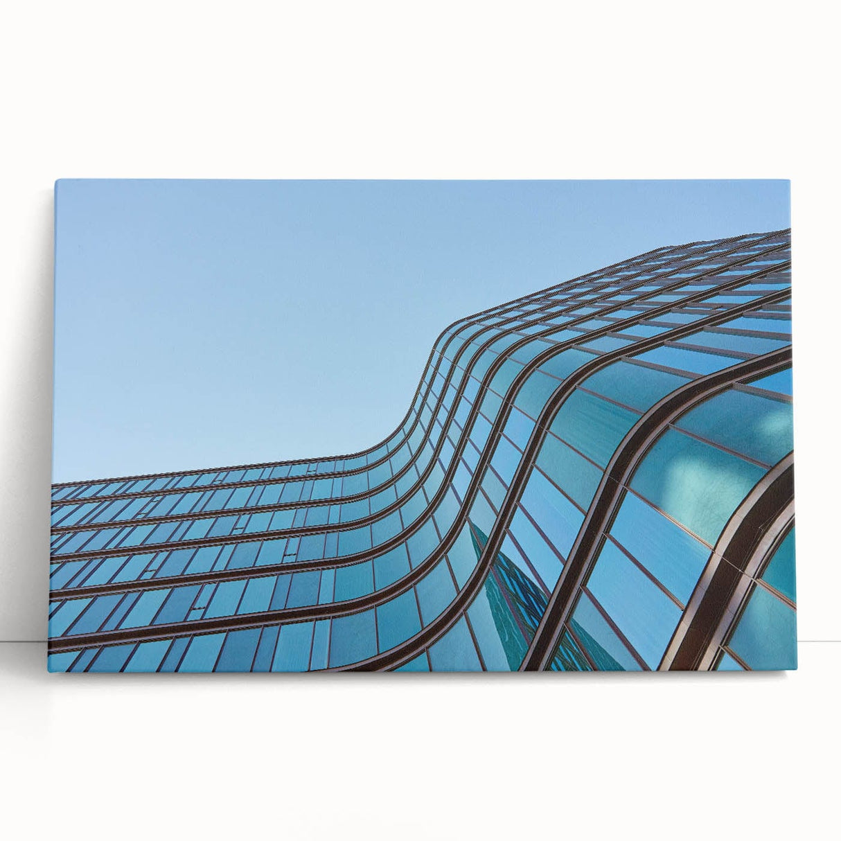 Urban skyline canvas prints – Sleek curved glass building photo