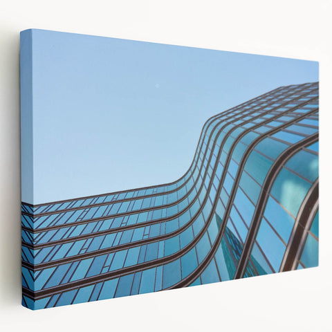 Urban skyline canvas prints – Sleek curved glass building photo