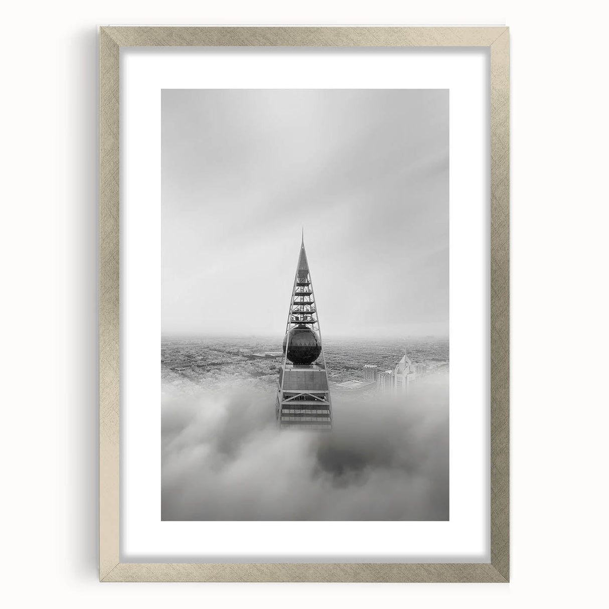 Cityscape photography prints – Iconic spire above the city clouds