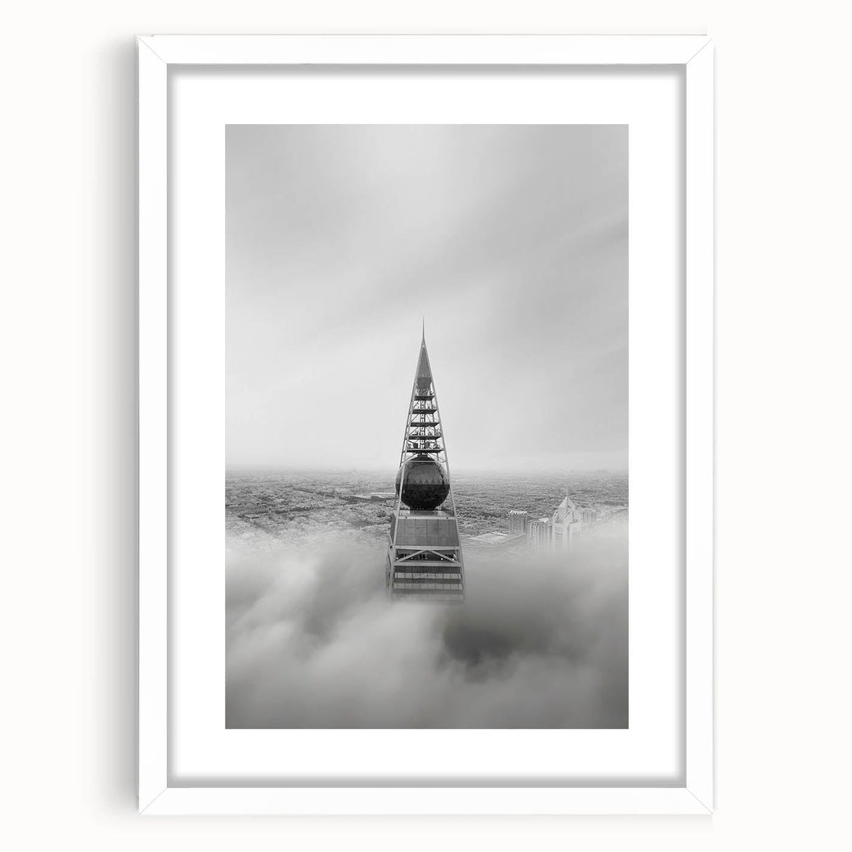 Cityscape photography prints – Iconic spire above the city clouds