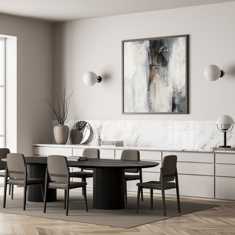 Neutral wall art in a minimalist dining room with soft earth tones and natural textures