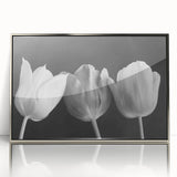 Vibrant floral canvas artwork showcasing intricate blossoms in vivid colors, elegantly rolled and packaged in a protective cardboard tube for shipping.