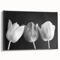 Vibrant floral canvas art showcasing a colorful arrangement of blooming flowers in shades of pink, yellow, and blue, perfect for enhancing home decor.