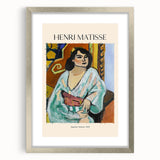 Abstract art print featuring swirling blue and gray tones on a framed canvas, suitable for bedroom or dining room decor.