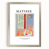 Abstract art print featuring swirling blue and gray tones on a framed canvas, suitable for dining room decor.