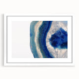 Abstract art print depicting swirling patterns in muted earth tones on canvas, suitable for bedroom or dining room decor.