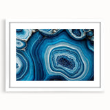 Abstract art print featuring swirling blue and green patterns on canvas, suitable for dining room or bedroom decor.