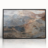 Large abstract wall art depicting swirling blue and green shapes on canvas.