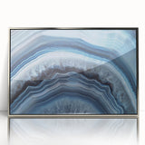 Mid-century modernist art featuring a serene lake landscape in pastel blue and green tones on a framed canvas.