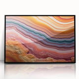 Large abstract wall art featuring swirling blue and green tones on canvas, ideal for modern living room decor.