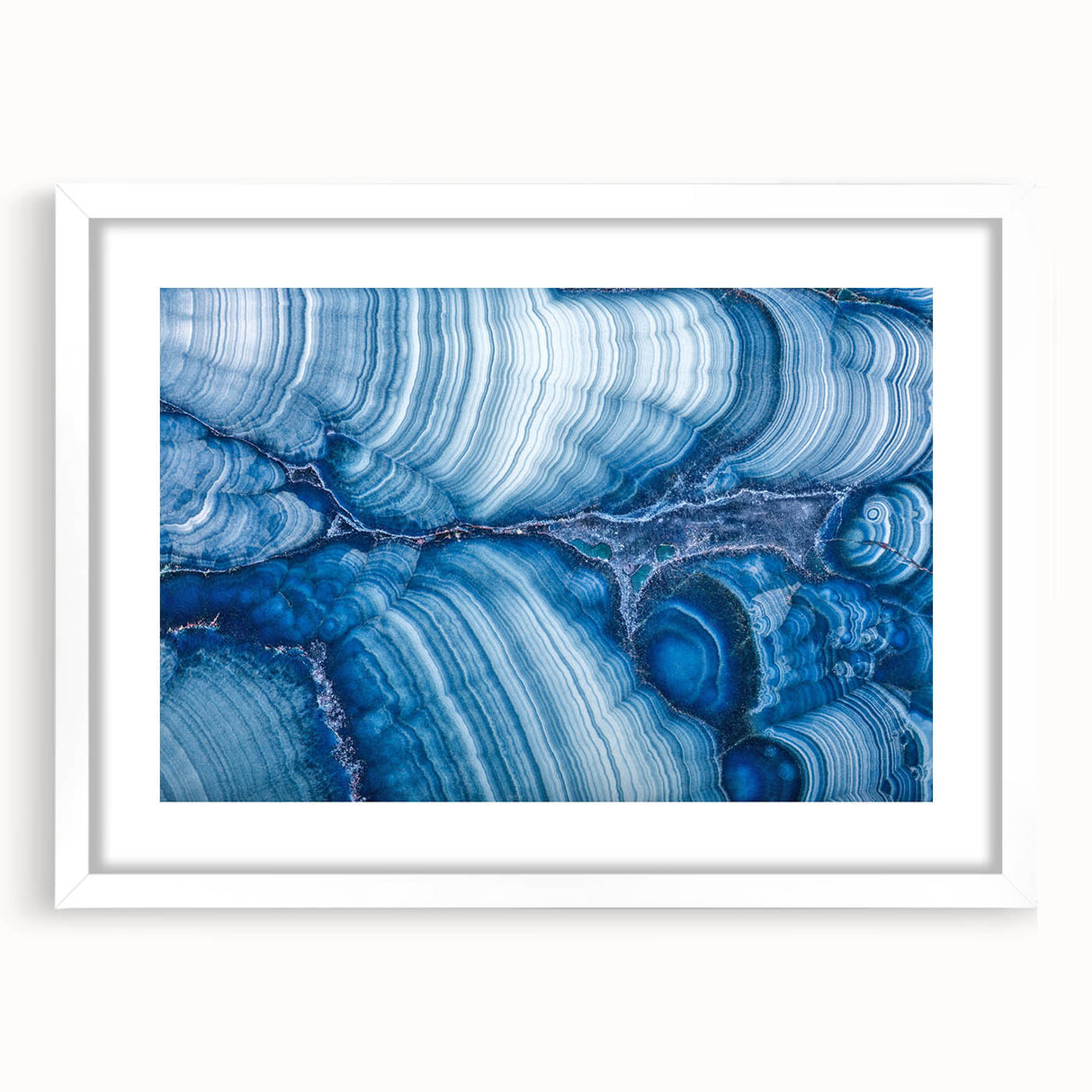 Abstract art print featuring swirling blues and greens on canvas, ideal for modern dining room decor.