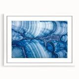 Abstract art print featuring swirling blues and greens on canvas, ideal for modern dining room decor.