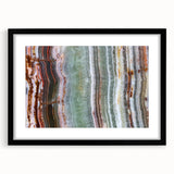 Abstract art print featuring a textured mix of vibrant colors on a large canvas, suitable for living room decor.
