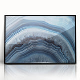 Large abstract wall art featuring swirling blue and green tones on canvas, ideal for modern art wall decor in living spaces.
