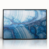 Large abstract wall art in mid-century modernist style with vibrant blue and green swirls on canvas.