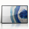 Large abstract wall art depicting swirling blue and gray tones on canvas, ideal for modern art wall decor.