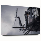 Large abstract wall art on canvas featuring swirling shades of blue and gray, ideal for modern bedroom or dining room decor.