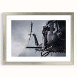 Textured abstract art print in muted gray and blue tones on canvas, suitable for modern bedroom decor.