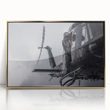 Large art print of a mid-century modernist cityscape in muted gray and blue tones on canvas.