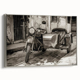Landscape painting of colorful vintage cars on a black background, printed on canvas.