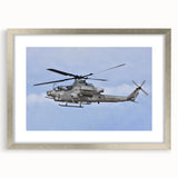 Textured abstract art print in muted gray and blue tones on canvas, suitable for modern bedroom decor.