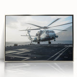 Mid-century modernist art featuring geometric shapes in muted orange and blue tones on a framed poster.