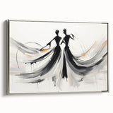 Framed abstract figurative wall art showcasing a modern design with silver accents, viewed from the side against a neutral background.