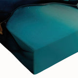 Close-up of a stretched canvas showcasing an abstract figurative design in vibrant colors, ideal for modern home decor and artistic expression.